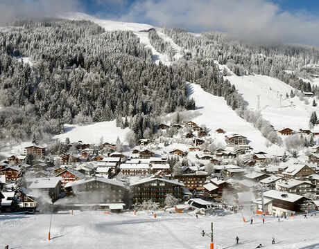 Chalets in Les Gets - a view looking from the Chavannes slopes across the resort centre to the Mont Chery lifts