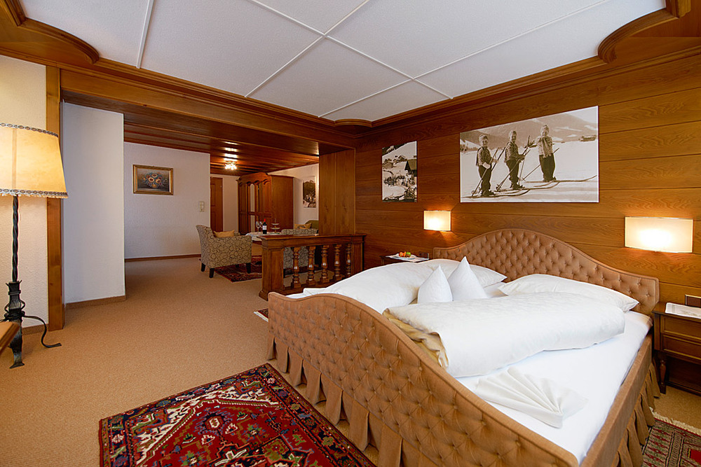 Ski in ski out hotels in Lech - a spacious bedroom in the Monzabon Hotel